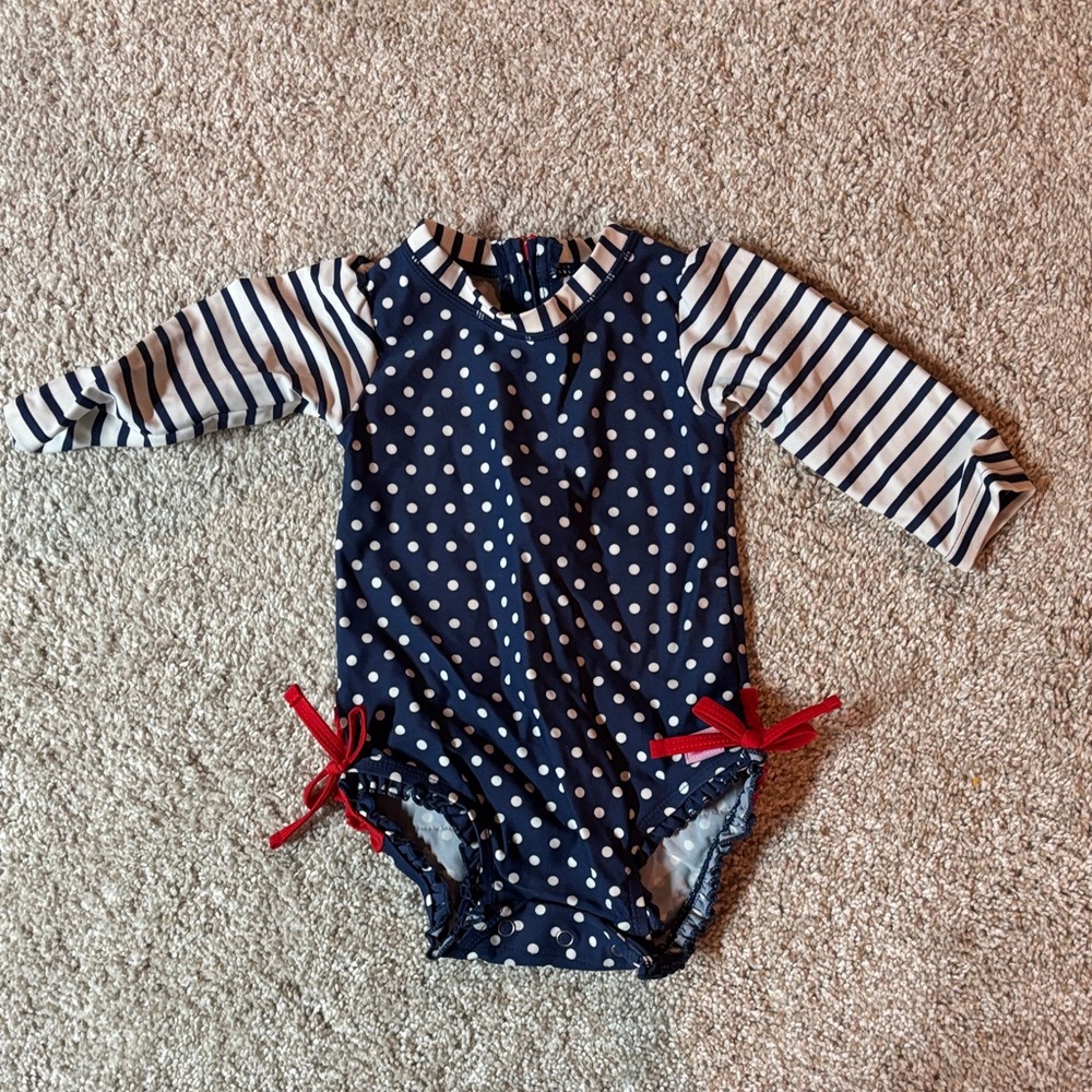 Ruffle Butts Navy and White Polka Dot swimsuit